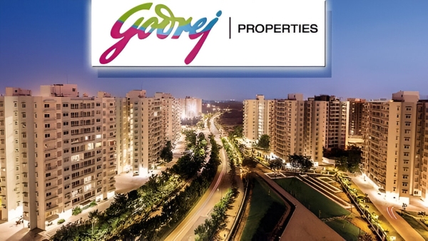 A brightly lit residential complex with signage for Godrej Properties.